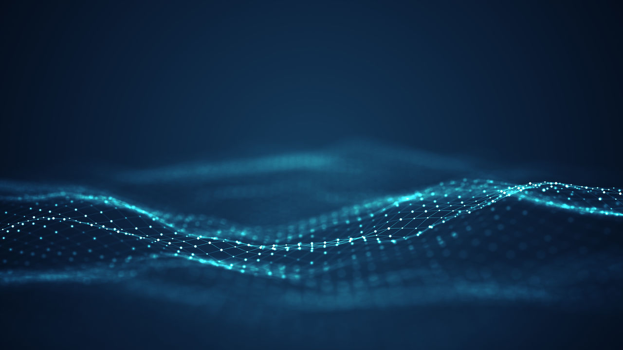 Technology digital wave background concept.Beautiful motion waving dots texture with glowing defocused particles. Cyber or technology background.